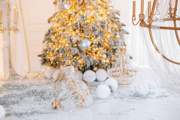 istock Magical Christmas setting with a beautifully decorated tree and gifts 2190305327