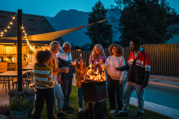 istock Multigenerational Family Enjoying Evening Bonfire 2190306230