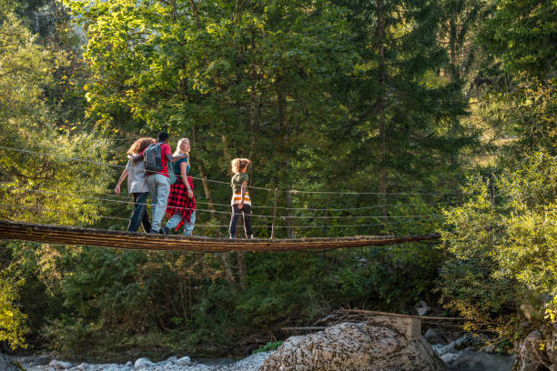 istock Multigenerational Family Adventure on Forest Bridge 2190306247