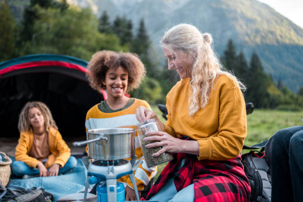 istock Family Bonding Over Campsite Cooking 2190306254