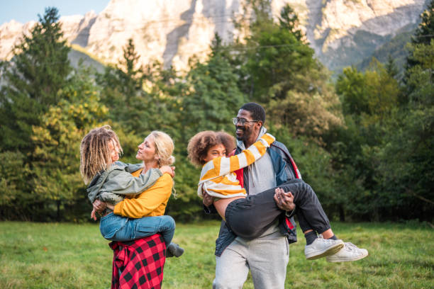 istock Joyful Diverse Family Enjoying Nature Together 2190306278