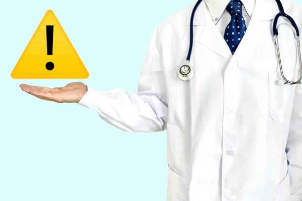 istock Male doctor giving warning 2190307900