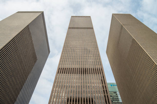 istock Dramatic Skyward Angle of Midtown Manhattan’s Soaring Skyscrapers Under Clear Blue Sky 2190309317
