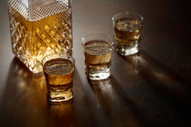 istock Decanter and small glasses of whiskey. 2190314335