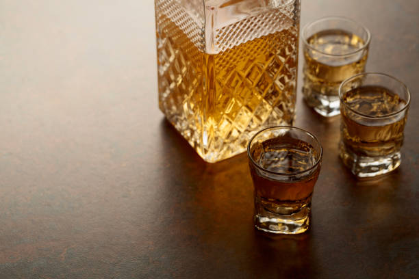 istock Decanter and small glasses of whiskey. 2190314343
