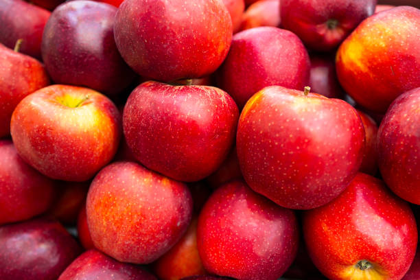 istock Red apples background. Fresh apple harvest. Ripe red apple. 2190316451