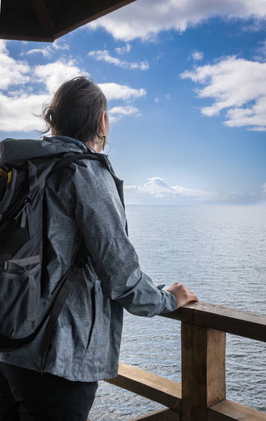 istock Traveling women with his back turned contemplating scenery. 2190319031