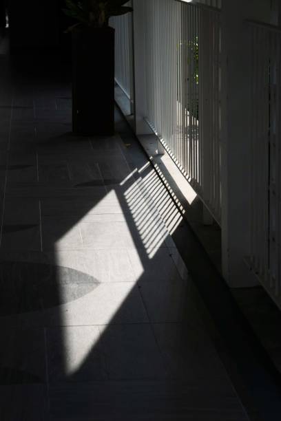 istock Strong Contrast of Light and Shadow Through Railing 2190324597
