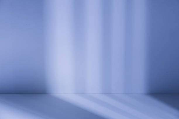 istock Studio style background wall decoration presentation uses white and blue tones. with shadows cast from a nearby window, concept creating a decorative 2190327506