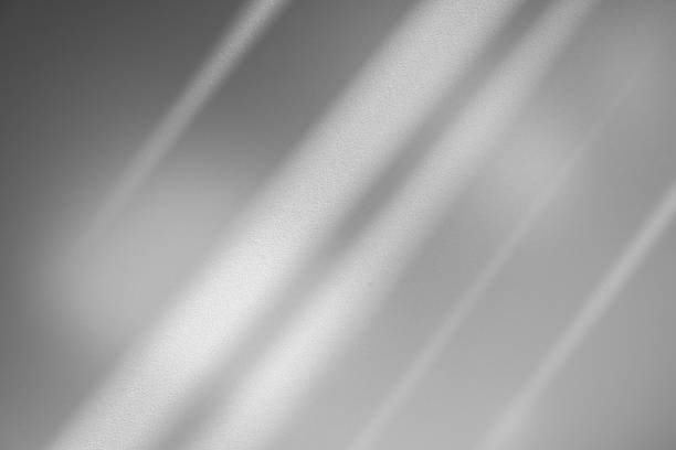 istock Wall interior background, studio and backdrops show products.with shadow from window color white . background for text insertion and presentation product 2190327511