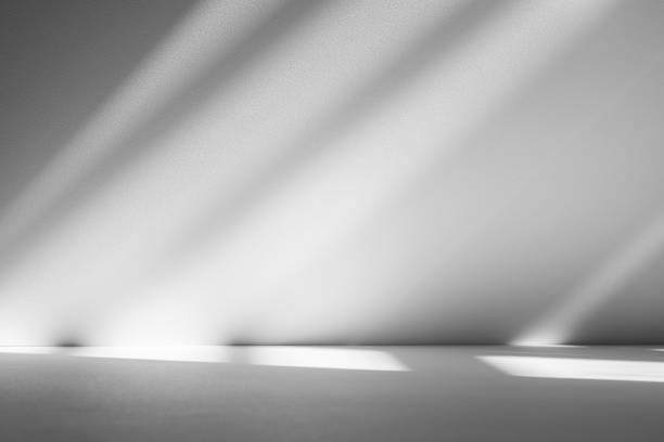 istock Wall interior background, studio and backdrops show products.with shadow from window color white . background for text insertion and presentation product 2190327525