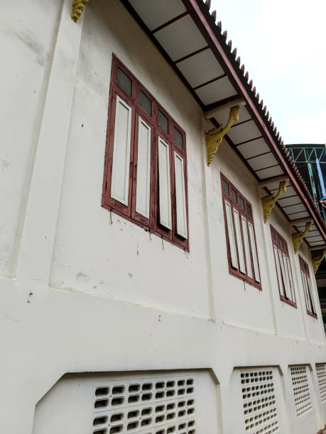 istock white monk residential building with golden roof 2190332946