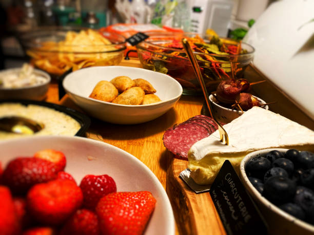 istock Fruits, cheeses, and dips on a charcuterie board 2190333663
