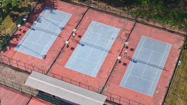 istock aerial view of three tennis courts 2190336054