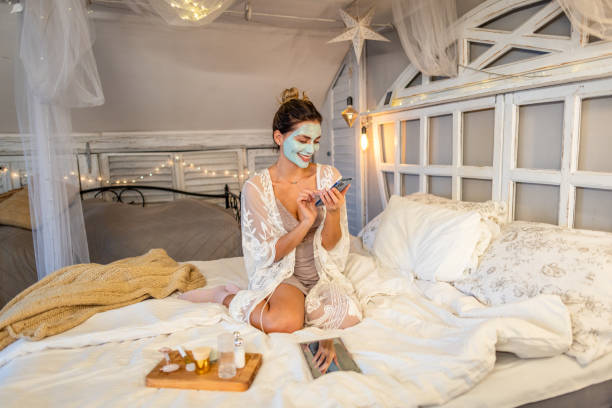 istock Young woman doing her beauty care routine 2190336241