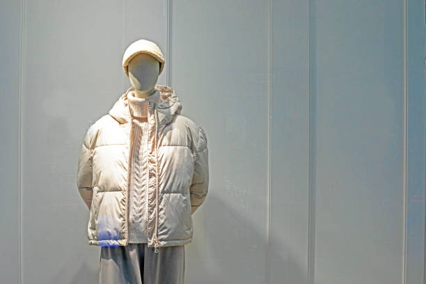 istock stylish female mannequin in a hat and a light jacket on a gray background 2190338379