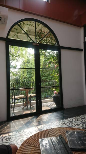 istock Door, Greenery Outside, and Wooden Interior 2190340830