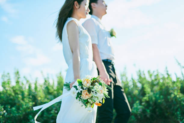 istock A wedding couple holding hands 2190345637