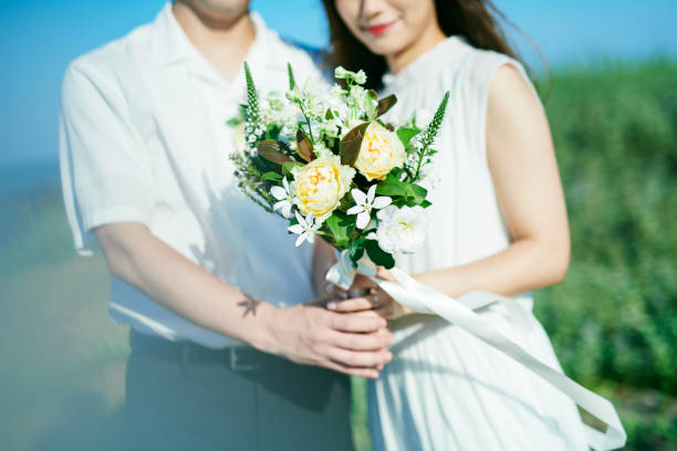 A wedding couple in the blue sky