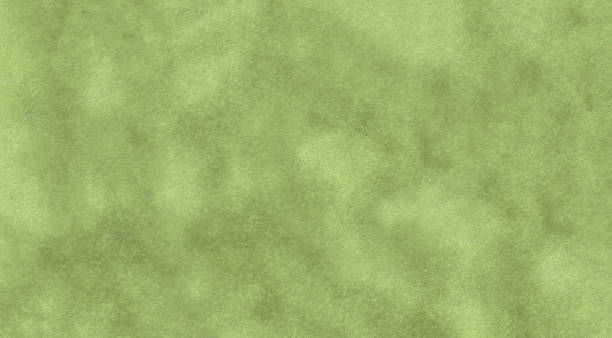 istock Light green rough mottled texture of the wall 2190349449