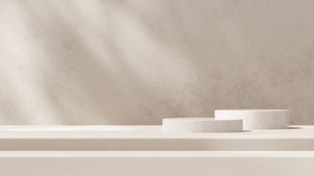 istock A 3D rendering of an empty space with a marble podium against a light brown background in a landscape layout, ideal for showcasing merchandise. 2190349486