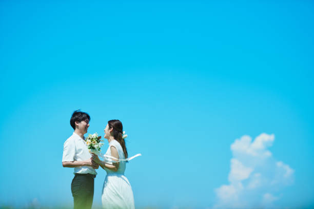 istock A wedding couple under the blue sky 2190349763