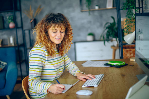 istock Woman working at her home office 2190350169
