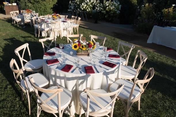 istock Outdoor wedding table setup with floral centerpieces. 2190350230