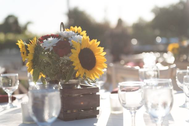 istock Sunlit table with sunflower centerpiece 2190350238