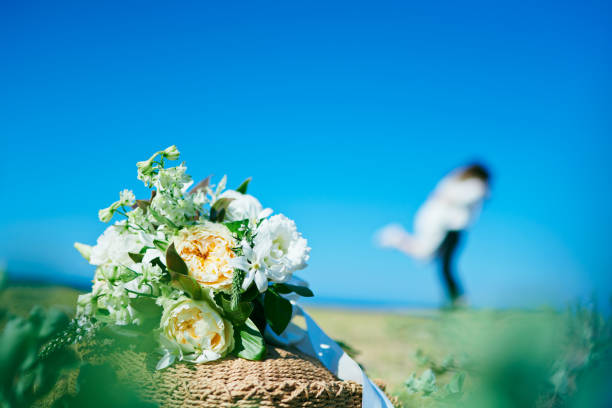 Bouquet and wedding couple