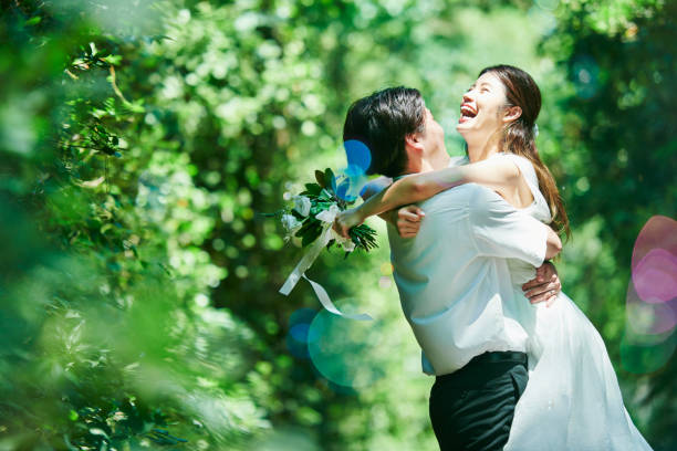 istock A wedding couple hugging and soap bubbles 2190351523