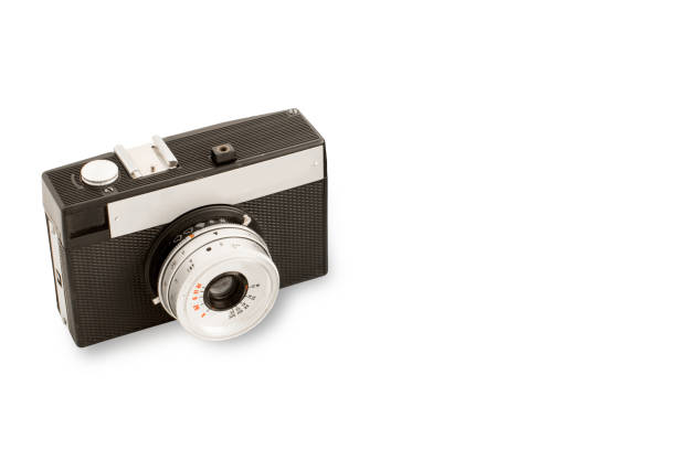 Isolated antique camera  with shadow on white background, analog photography concept, copy space