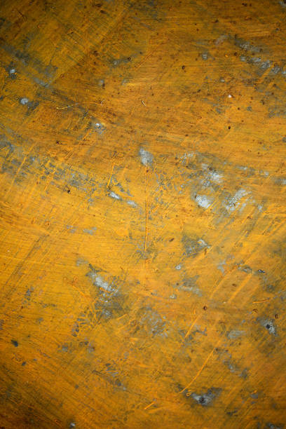 Rough yellow painted steel background