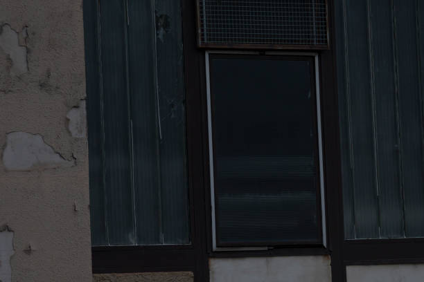 istock This is a closeup view of a window featuring blinds on a building 2190357580