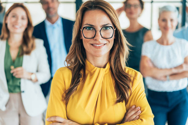 istock Confident business woman and her team 2190362822