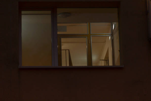 istock A window is on the side of a building in the evening 2190364450