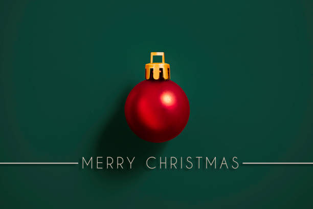 Christmas ornament with Merry Christmas message on green background