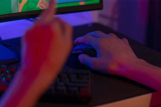 istock A person is currently engaged in playing a video game on a computer 2190366919