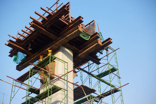 Construction of a high-rise building with scaffolding and construction equipment