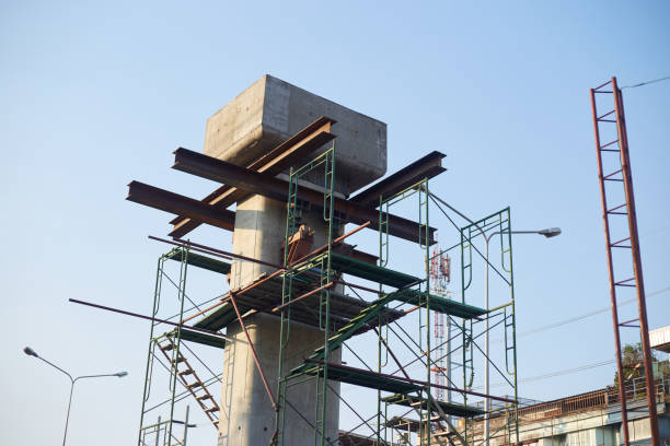 istock Construction of a high-rise building with scaffolding and construction equipment 2190368631