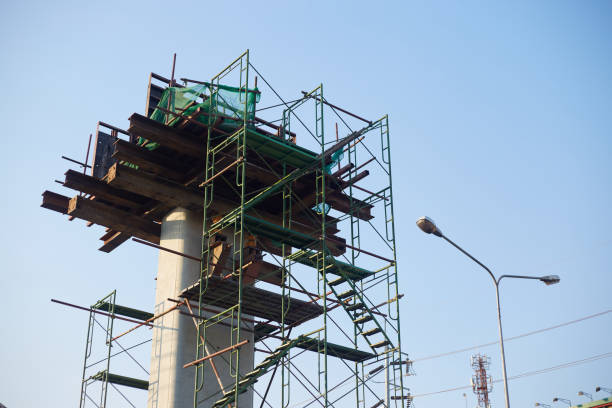 istock Construction of a high-rise building with scaffolding and construction equipment 2190368658