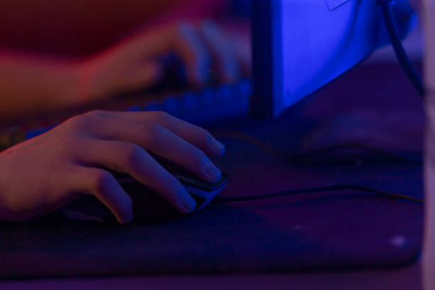 istock A person uses a mouse in front of a computer monitor 2190372575
