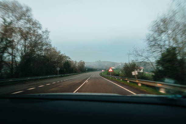 istock View of a road from a car 2190373046