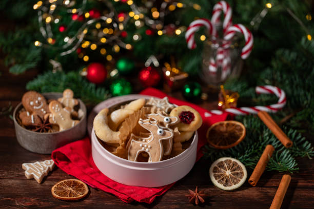 Festive Christmas cookies decorated with icing and powdered sugar