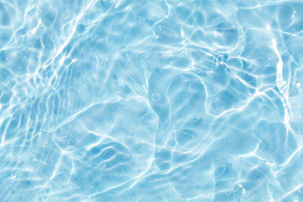 istock blue water wave abstract. natural ripple and bubble texture. gel soap. background photography. 2190375331