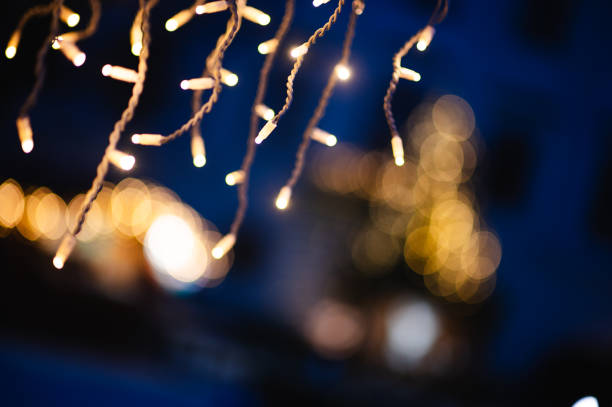 istock Abstract bokeh lights against blue evening sky 2190375779