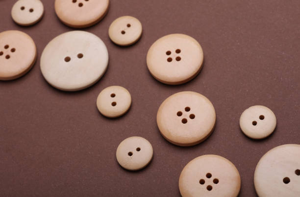Set of Wooden buttons on a brown background