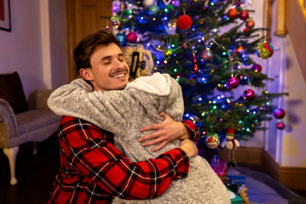 istock Brother And Sister Hugging 2190377011