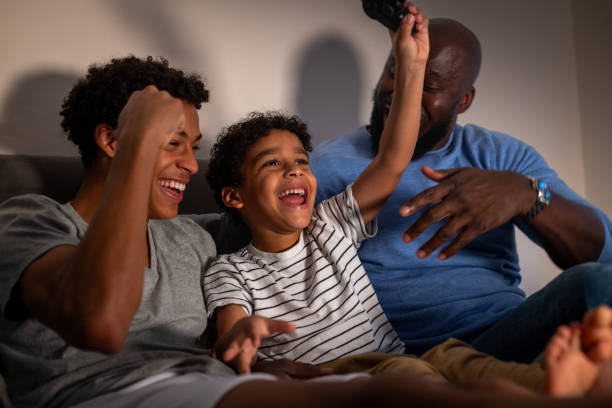 istock Celebratory Moments Playing Video Games 2190377453