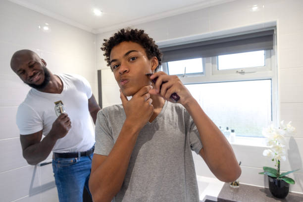 Father and Son Getting Ready in the Bathroom